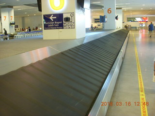 15 99g. Air Asia flight to Kuala Lumpur - lonely vigil at baggage claim