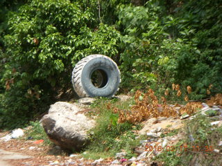 81 99h. Malaysia - Kuala Lumpur - Exciting Mountain Hike - tire marking the road