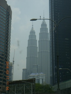 87 99h. Malaysia - Kuala Lumpur - drive back from hike - twin Petronas towers