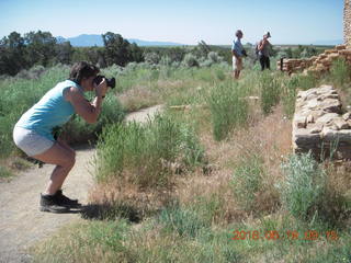 71 9ck. Lowry Pueblo Landmark - Karen taking a picture