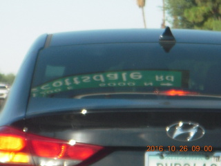 Scottsdale Road sign reflected in reverse