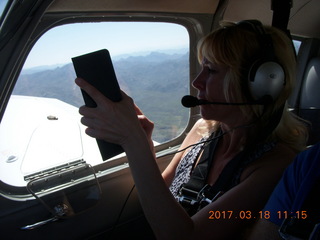 1683 9mj. Kim T taking pictures flying in N8377W