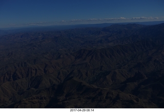 darkened aerial photo of mountains