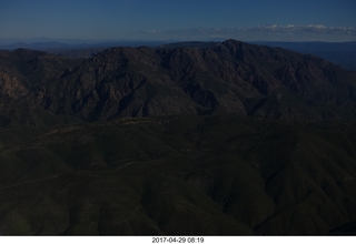 darkened aerial photo of mountains