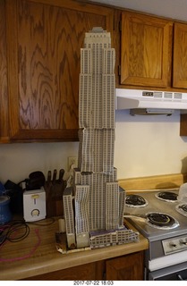 my cardboard Empire State  Building trashed by my cat Max