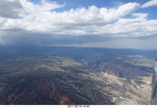 220 9sk. aerial - Sand Wash area - clouds and rain