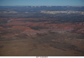 aerial - Utah - orange Vermillion cliffs with white cliffs behind