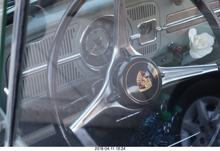 pretty Volkswagon beetle with Porsche label on steering wheel