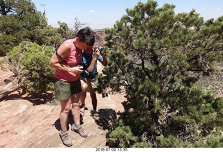 143 a03. Colorado National Monument + Shaun and Karen taking a picture of a squirril