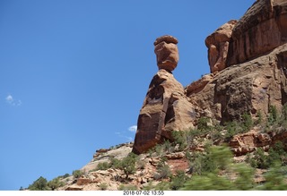 Colorado National Monument + Shaun and Karen taking a picture of a squirril