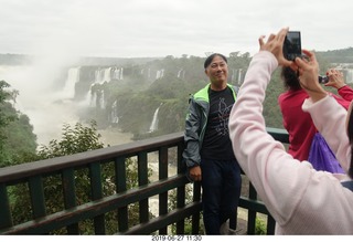 153 a0e. Iguazu Falls + Peter and Regina Lee taking a picture