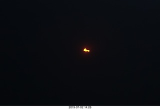 partial eclipse sunset