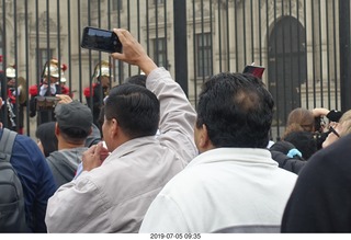 302 a0f. Peru - Lima tour - changing of the guard - cell phone photographers