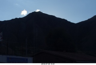 409 a0f. Peru - Cusco to hotel bus ride - sunlit clouds