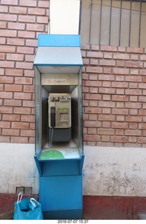 136 a0f. Peru - drive to cusco - market - pay phone