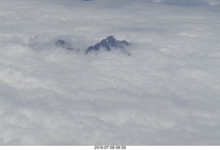 aerial - Peru - flight from Cusco to Lima - Andes Mountains - cumulus granite clouds