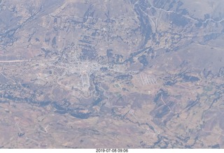 aerial - Peru - flight from Cusco to Lima - Andes Mountains - town