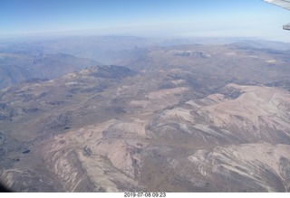 aerial - Peru - flight from Cusco to Lima - Andes Mountains - colored rocks