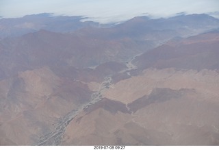 aerial - Peru - flight from Cusco to Lima - Andes Mountains - many colored rocks