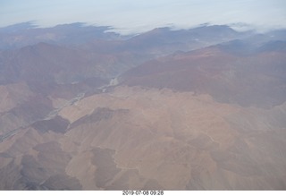 aerial - Peru - flight from Cusco to Lima - Andes Mountains - colored rocks