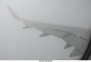 131 a0f. aerial - Peru - flight from Cusco to Lima  - wing in clouds