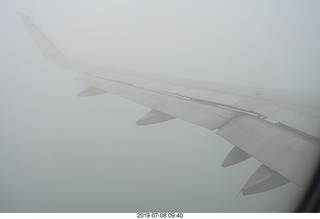 132 a0f. aerial - Peru - flight from Cusco to Lima - wing in clouds