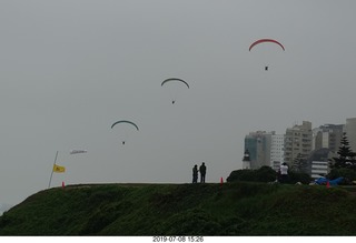 252 a0f. Peru - Lima - beach garden walk - powered parachute pilots