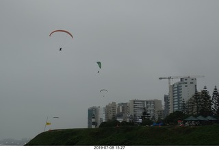 256 a0f. Peru - Lima - beach garden walk - powered parachute pilots
