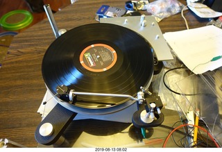 70 a0g. Trasncriptor Skeleton turntable and Vestigal tonearm playing a record