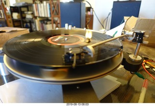 72 a0g. Trasncriptor Skeleton turntable and Vestigal tonearm playing a record