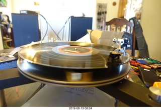 81 a0g. Trasncriptor Skeleton turntable and Vestigal tonearm playing a record