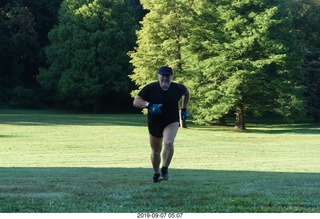 3196 a0h. Curtis Arboretum - Cheltenham XC alumni race - Adam running (before the race)