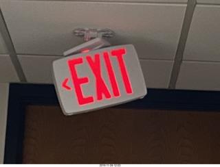 OCD hallway with tilted EXIT sign