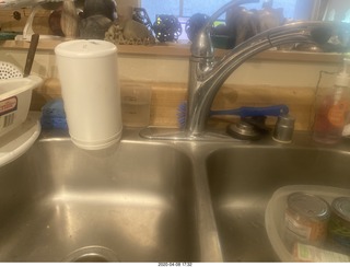 I covered my drinking-water faucet so my cat Devin won't drink it