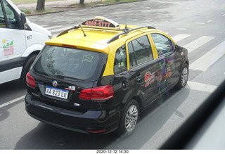 273 a0y. Argentina - Buenos Aires tour - dented taxi cab