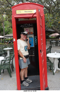 302 a0y. Argentina - Buenos Aires tour - telephone booth + Adam