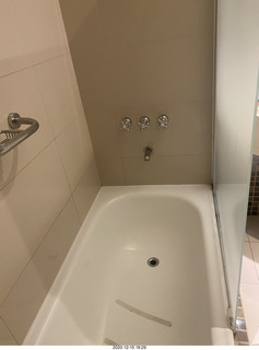 11 a0y. Argentina - Neuquen - hotel shower with controls hard to reach