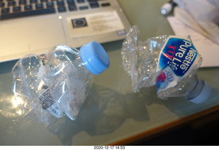 48 a0y. crumpled bottles so they can't reuse them