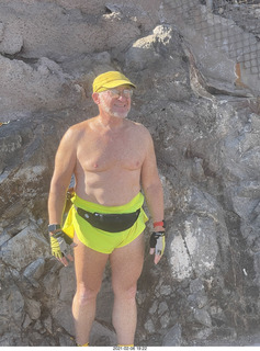 Adam shirtless atop North Mountain hike