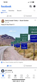 multiple signs for Senior Center - humor