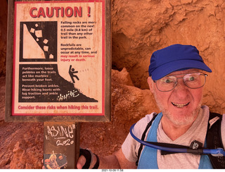 158 a18. Bryce Canyon - Wall Street hike - Adam - caution sign
