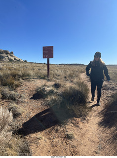 Utah - Canyonlands National Park - Lathrop hike - Shea and sign