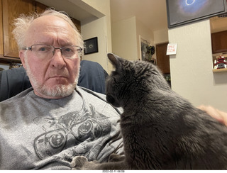 Adam with my cat Devin on my lap