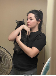 door open with cat Miss Pris in the bathroom with Olga