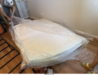 209 a1h. home construction - mattress coming out of the box