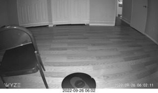 dark room with Sharknado robot vacuum