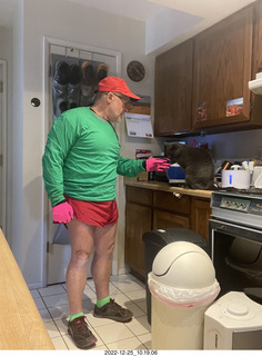 Adam dressed for bicycling in red and green for Christmas