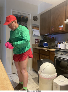 Adam dressed for bicycling in red and green for Christmas