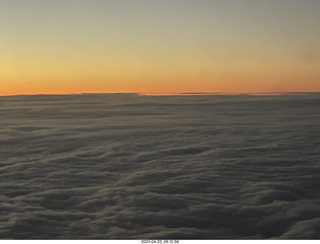 14 a1s. airline aerial sunrise over the ocean