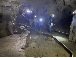 117 a1s. New Zealand - Spellbound Glowworm & Cave Tours - cave with helmets